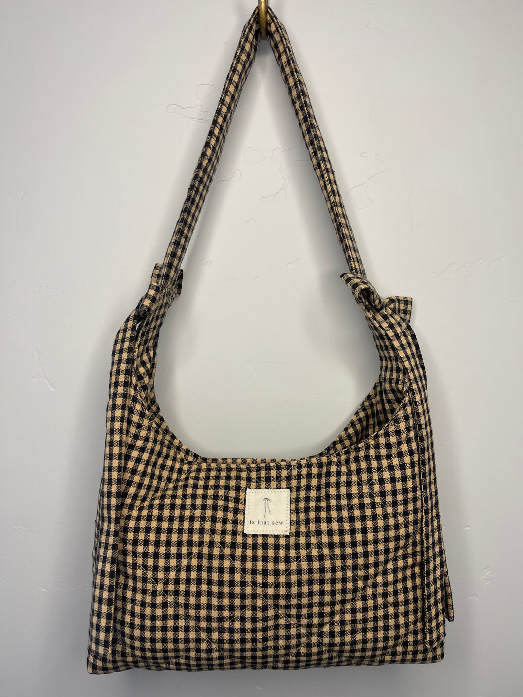 the black and tan gingham mini