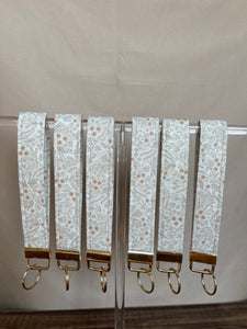 the neutral florals keychain