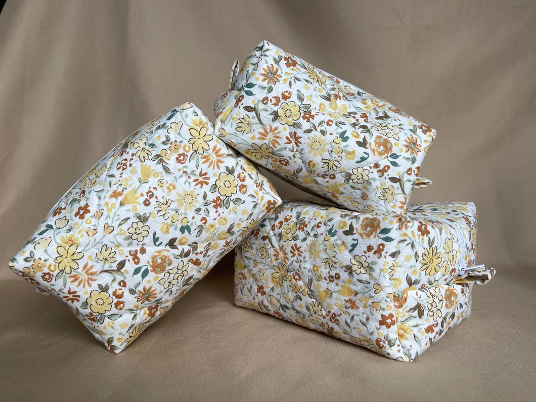 the butter yellow florals makeup bags