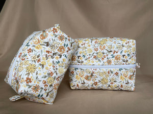 the butter yellow florals makeup bags