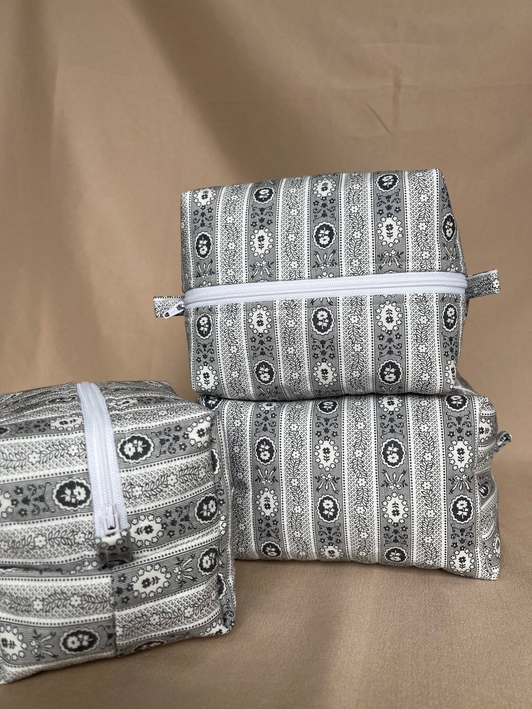 the charcoal bloom makeup bags