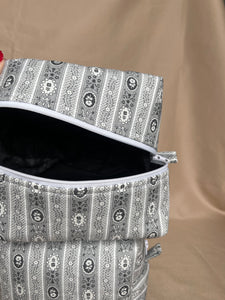 the charcoal bloom makeup bags